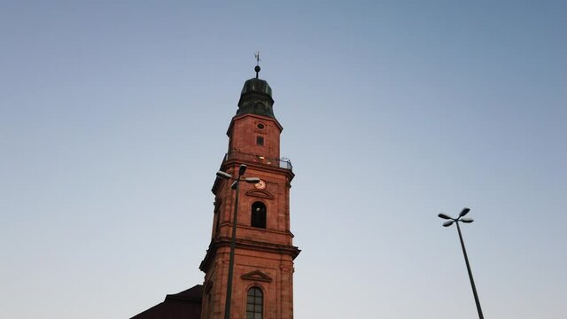ERLANGEN, GERMANY - 2nd September 2020 :Hugenotten Kirche in city square of Erlangen, Germany. Erlangen is in Nuremberg Metropolitan Region (3.5 million people)