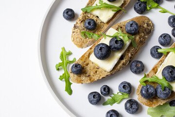 baguette with brie and blueberries