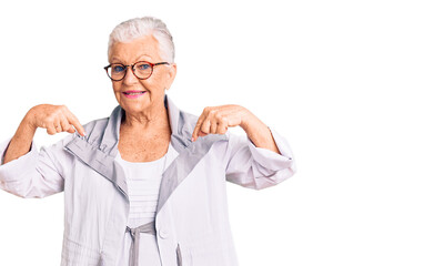 Senior beautiful woman with blue eyes and grey hair wearing casual clothes and glasses looking...