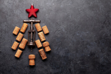 Christmas greeting card with fir tree shaped corkscrew and corks