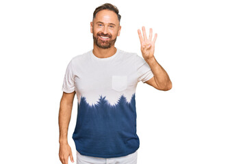 Handsome middle age man wearing casual tie dye tshirt showing and pointing up with fingers number four while smiling confident and happy.