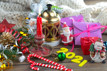 Fototapeta na wymiar Merry Christmas and Happy New Year, postcard with gifts and Christmas decorations.