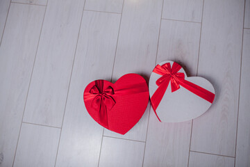 Close up of gift boxes in heart shaped. Heart shaped gift boxes on Valentine's day .