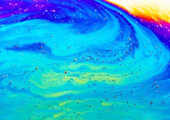 Abstract background with colorful gradient colors. Soap bubble close up macro abstraction.