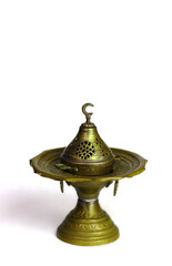 Fototapeta na wymiar traditional Oriental incense burners, candlesticks, lamp isolated on a white background. Muslim style.