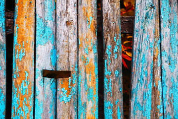 Old painted wooden fence planks