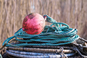 Pile of blue ropes and buoys
