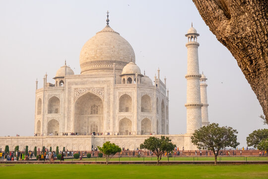 Taj Mahal image at a different angle with tourists foggy sky - Powered by Adobe