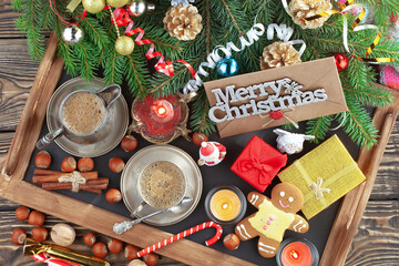 Merry Christmas, postcard with gifts and Christmas decorations.