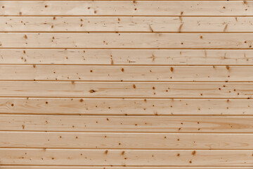 Facade Board installed in the sauna made of coniferous wood
