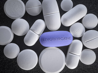 Levothyroxine Blue Pill on black backround