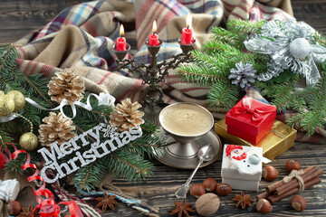 Merry Christmas card with gifts and, coffee and Christmas decorations.