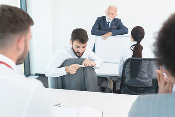 Male student caught cheating in the classroom