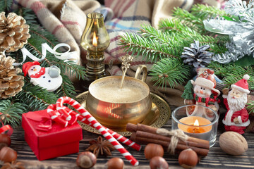 Merry Christmas card with gifts and, coffee and Christmas decorations.