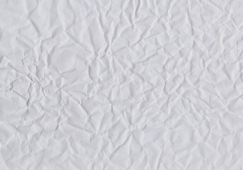 Closeup crumpled light grey paper  texture background, texture. Grey paper sheet board with space for text ,pattern or abstract design backdrop.