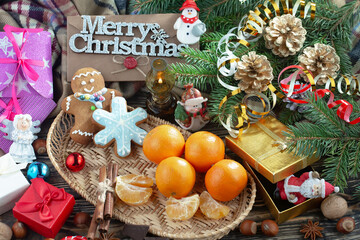 Merry Christmas, postcard with gifts and Christmas decorations.