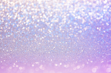Soft image abstract bokeh ultra violet,purple,pink ,blue color with light background.Ultra violet night light elegance,smooth sparkling glittering backdrop or artwork design for roman and celebration.