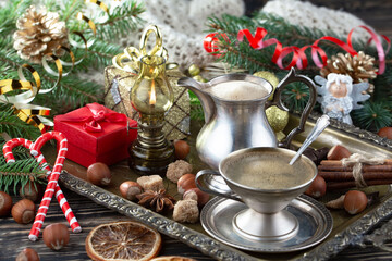 Merry Christmas card with gifts and, coffee and Christmas decorations.