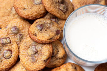Close-up of homemade chocolate chip cookies and milk