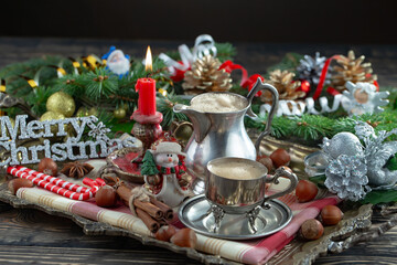 Merry Christmas card with gifts and, coffee and Christmas decorations.