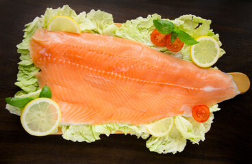 salmon red sea fish on a dark background