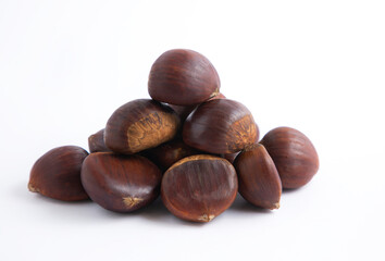 Fresh Chestnuts fruit isolated in wooden bowl on white background