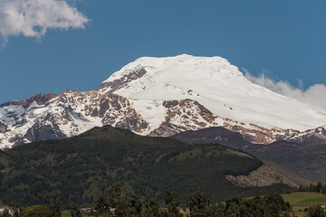 mountain with snow landscape in Cayambe, with clear sky, photo in the day