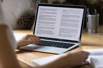 Close up view of modern technology digital gadget opened computer with electronic documents on...