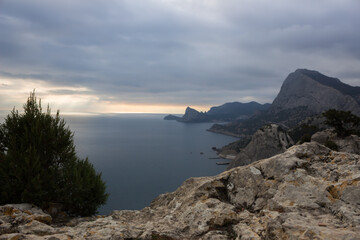 Fototapeta na wymiar View of Cape Capchik and Sudak Bay from Mount Krepostnaya (the Fortress mountain), Sudak, Crimea
