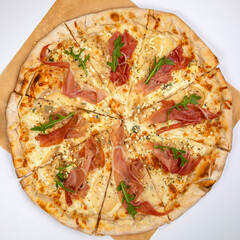 Pizza with cheese and ham in an Italian pizzeria
