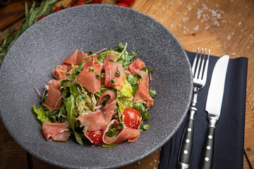 Salad with meat in an American bistro
