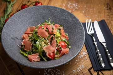 Salad with meat in an American bistro
