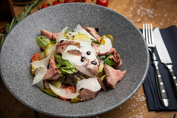 Salad with meat in an American bistro
