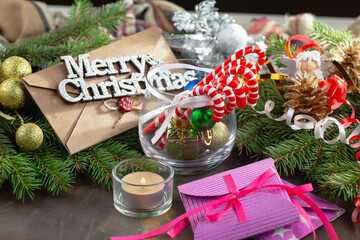 Merry Christmas, postcard with gifts and Christmas decorations.