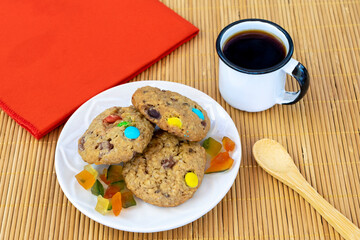 delicious colorful chocolate chip cookies with coffee