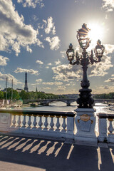Fototapeta premium Paris, France - May 23, 2020: Famous street lantern on the Alexandre III Bridge in Paris