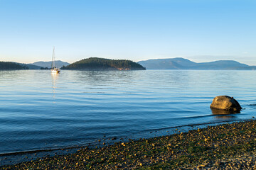 Sailboat anchored in Swift's Bay on Lopez Island, Washington, USA