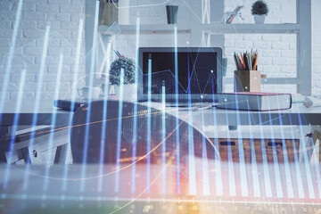 Double exposure of financial graph drawing and office interior background. Concept of stock market.