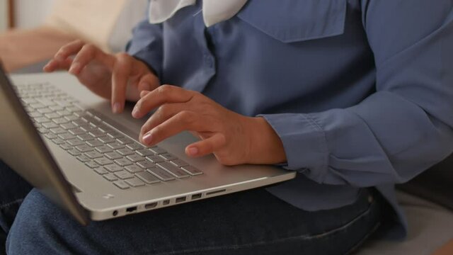 Close up image of woman hands typing on notebook, copy writer, working on laptop computer