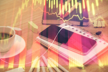 Double exposure of forex chart drawing and cell phone background. Concept of financial trading