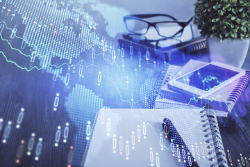 Double exposure of forex chart drawing and cell phone background. Concept of financial trading