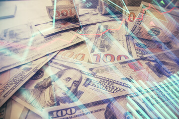Multi exposure of forex chart drawing over us dollars bill background. Concept of financial success markets.