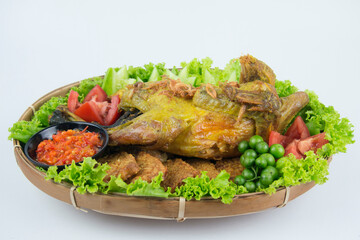 Ayam Ingkung Jawa is a legendary Indonesian favorite traditional fried chicken.