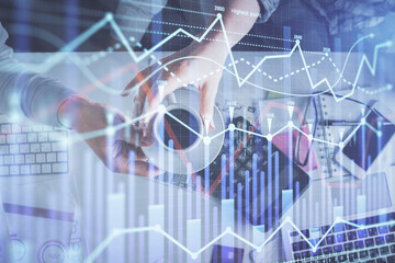 Double exposure of man and woman working together and financial chart hologram drawing. market analysis concept. Computer background. Top View.