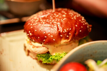 chicken burger with melted cheese