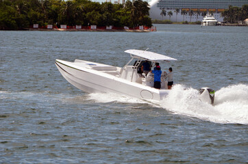 Twin hulled motor boat speeding on Biscayne Bay off Miami Beach,Florida