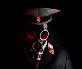 Portrait photo of a post apocalyptic military officer in uniform suit and peaked cap standing in...