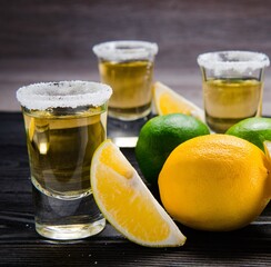 Tequila drink served in glasses with lime and salt