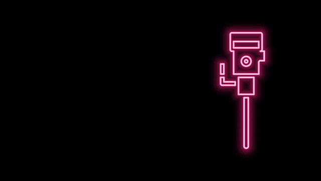 Glowing neon line Construction jackhammer icon isolated on black background. 4K Video motion graphic animation