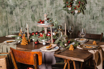 New Year's or Christmas table. The table is covered with food. 2021